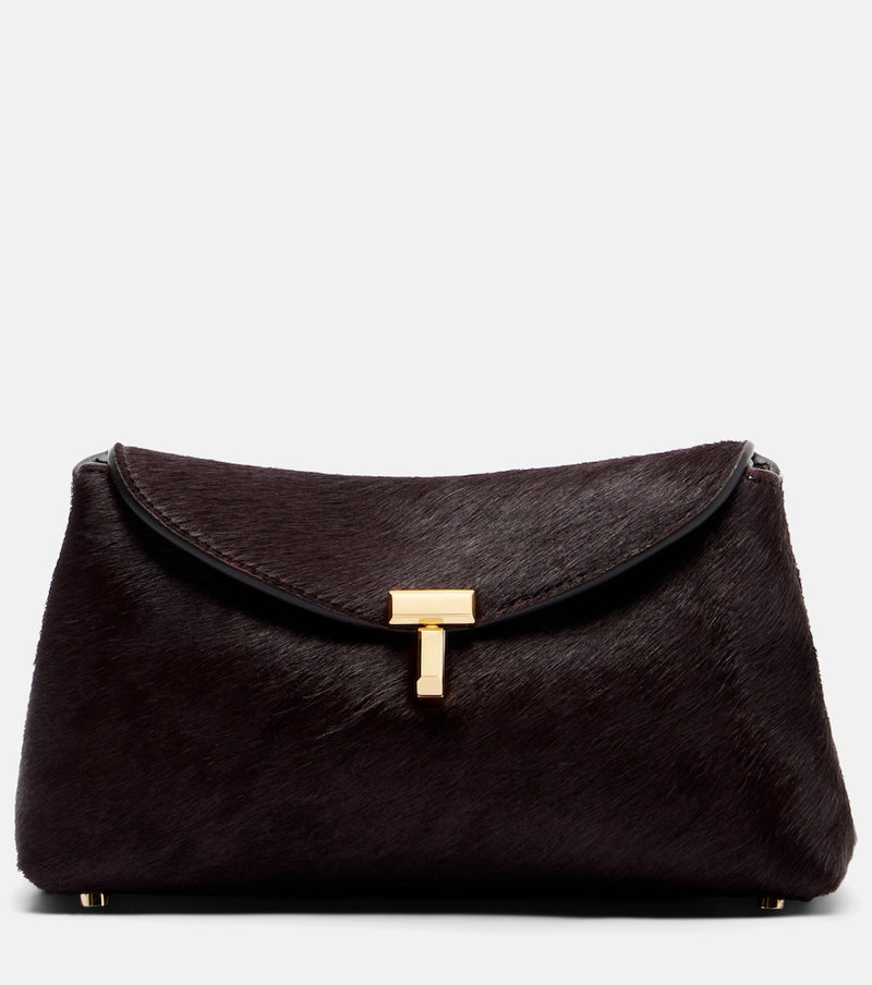 Toteme T-Lock Mini calf hair clutch in Burgundy