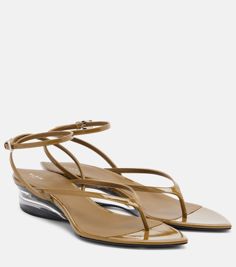 Alaia Invisible patent leather wedge thong sandals