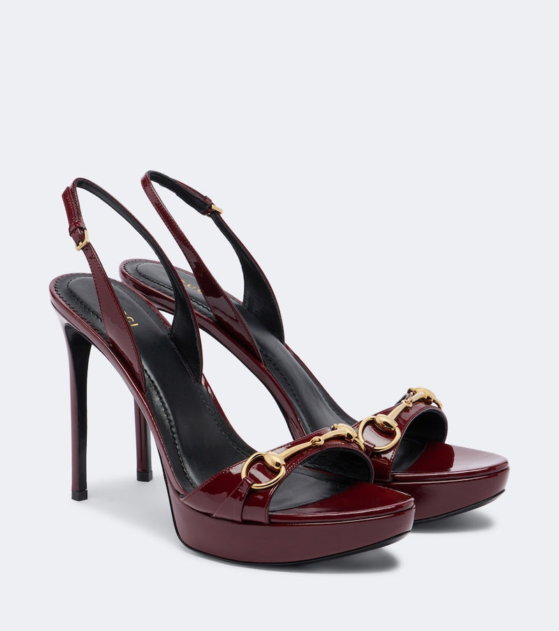 Gucci Donna patent leather platform sandals — burgundy patent leather slingback pair with gold horsebit strap detail