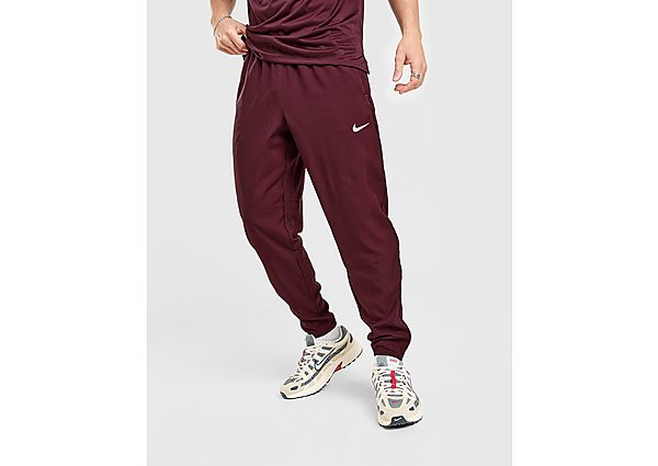 Nike Challenger Woven Track Pants red